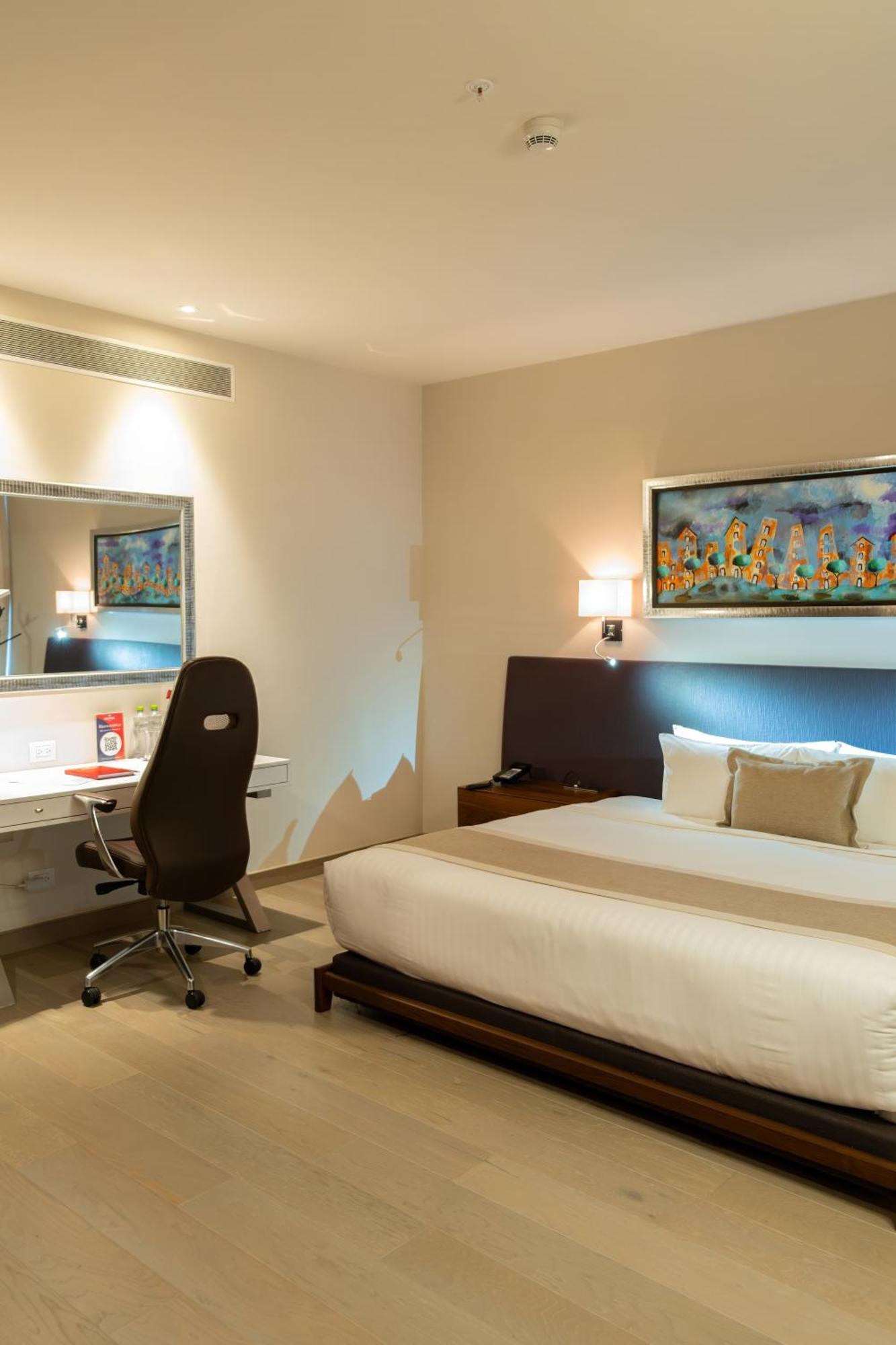 Metria Hotel 莱昂 外观 照片 A room at the hotel