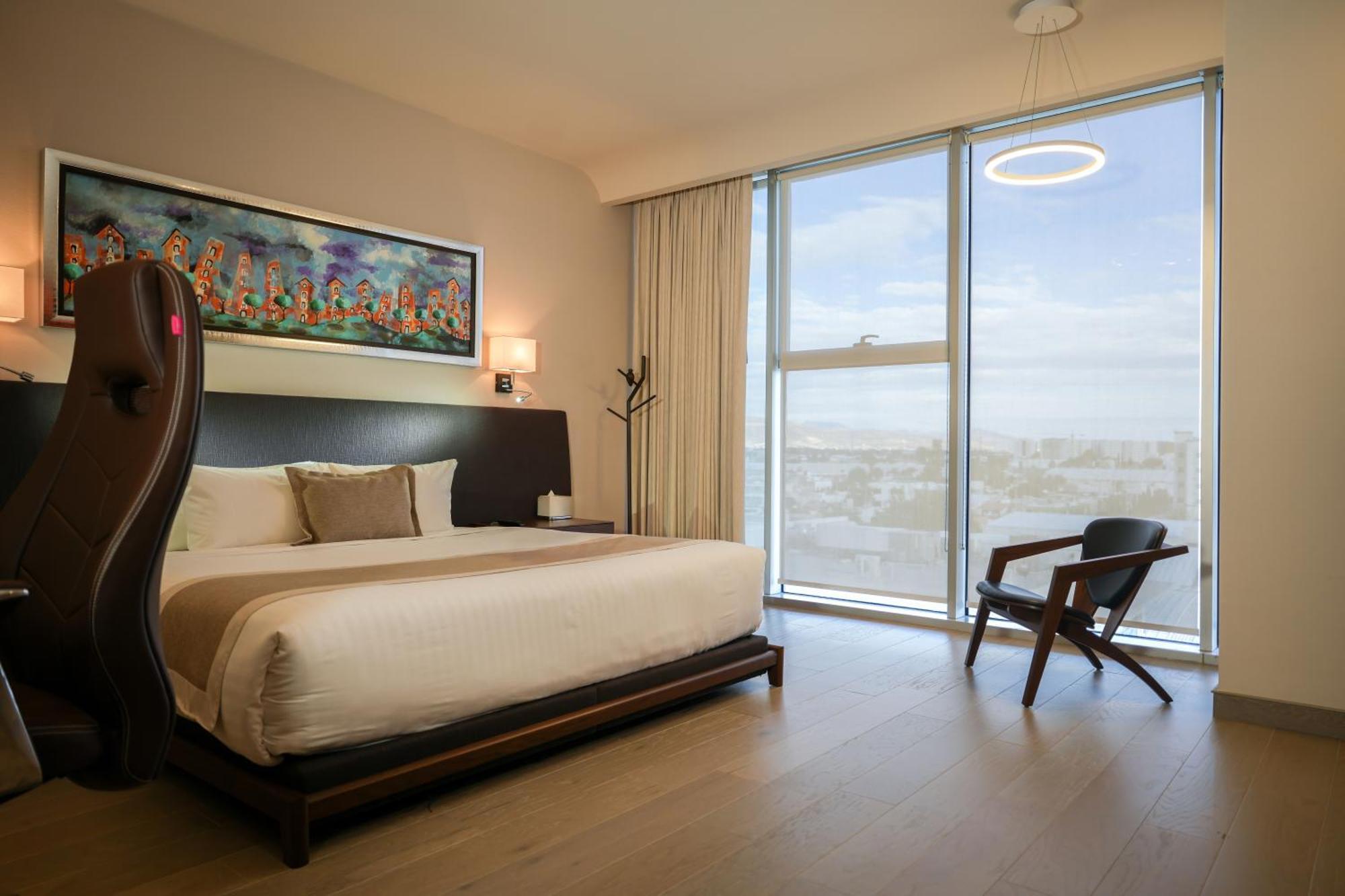Metria Hotel 莱昂 外观 照片 A bedroom at the hotel