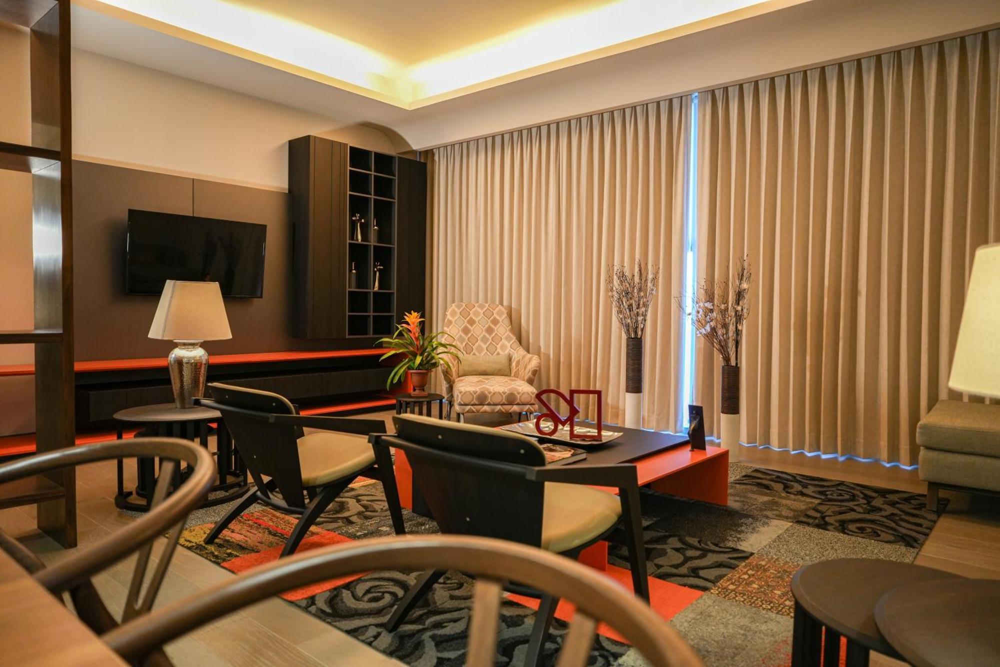 Metria Hotel 莱昂 外观 照片 A living room in a condominium